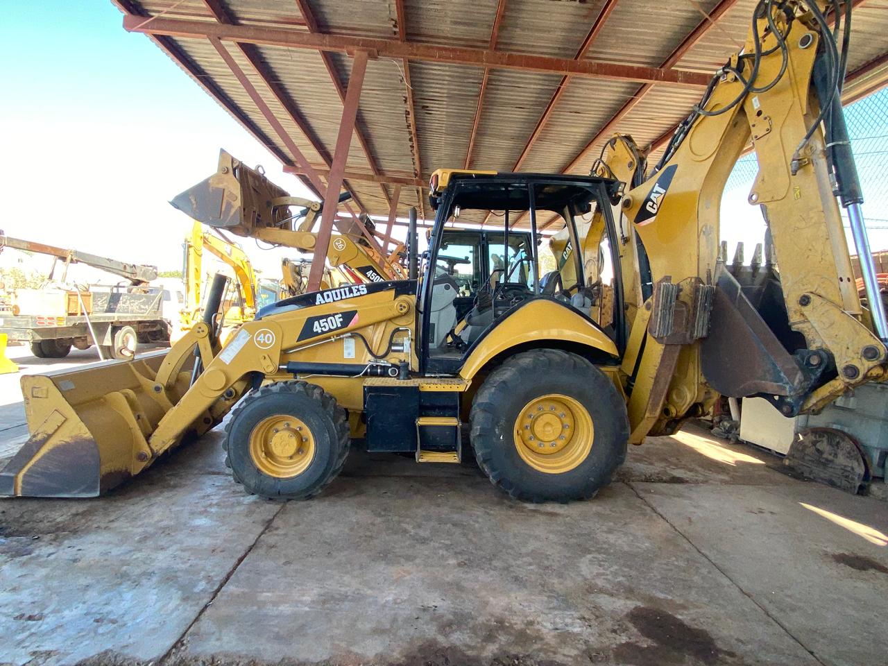 Retroexcavadora CAT 450F #1