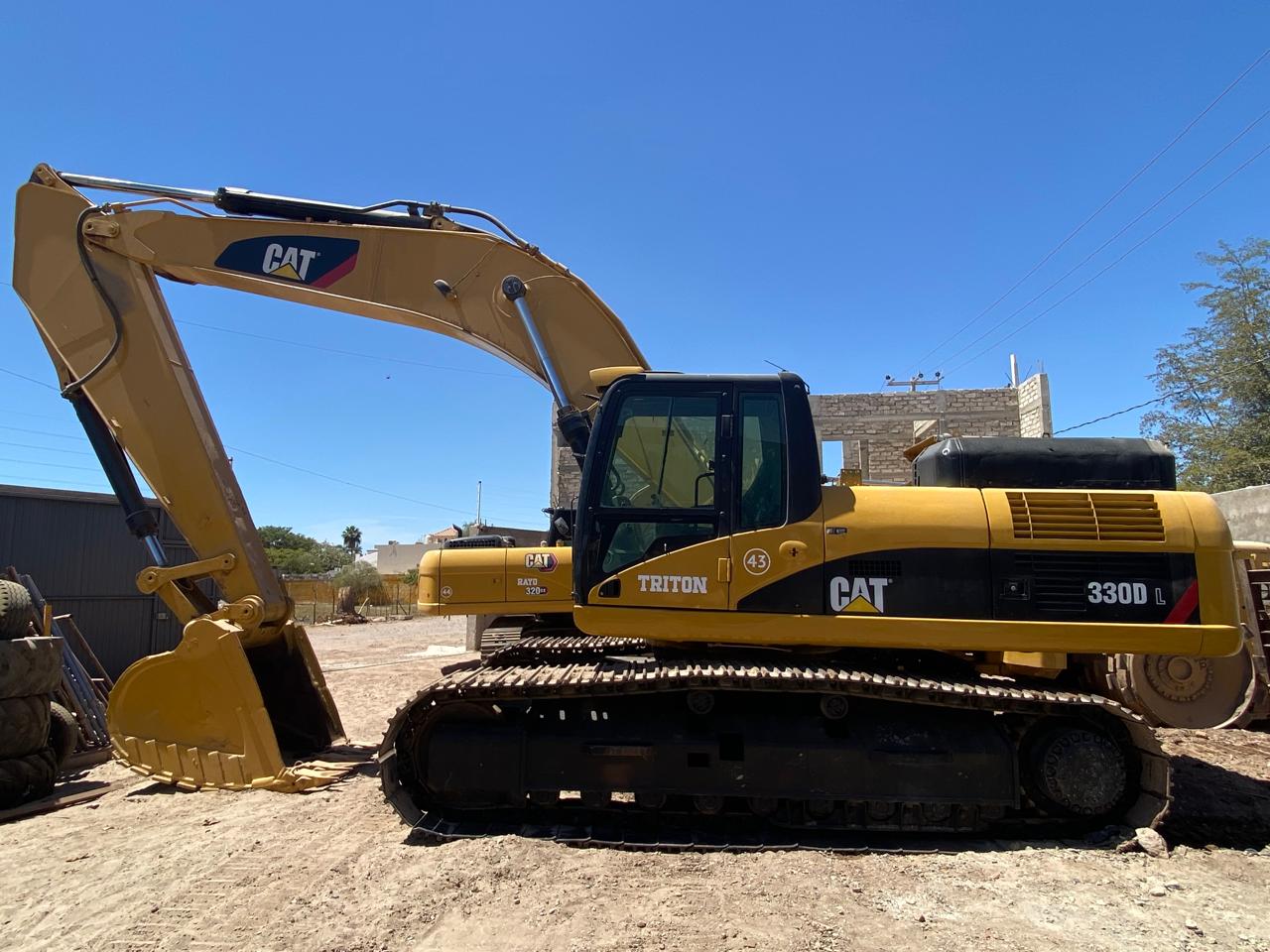Excavadora CAT 330DL + Martillo Hidráulico