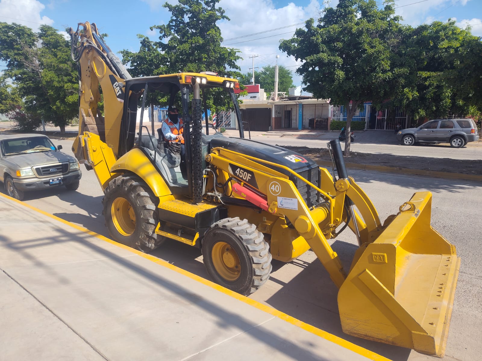 Retroexcavadora CAT 450F #1